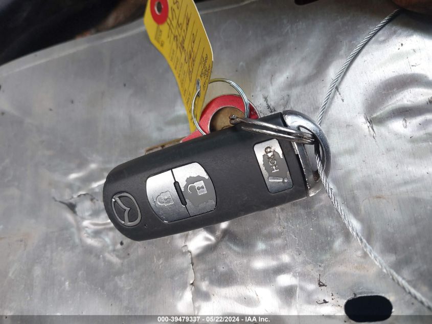 2015 Mazda Mazda3 I Touring VIN: 3MZBM1L71FM144610 Lot: 39479337