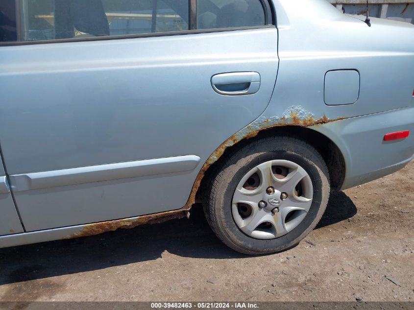 2005 Hyundai Accent Gls VIN: KMHCG45CX5U638691 Lot: 39482463