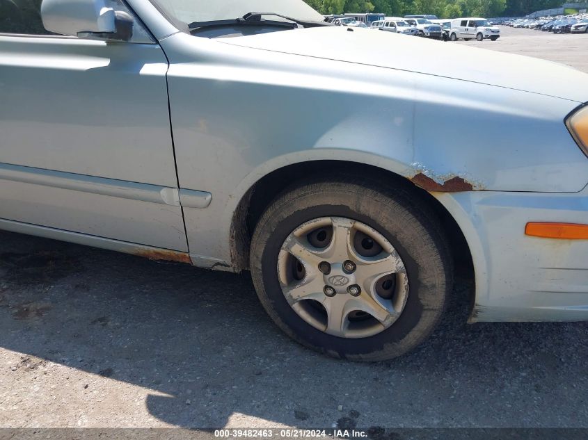 2005 Hyundai Accent Gls VIN: KMHCG45CX5U638691 Lot: 39482463