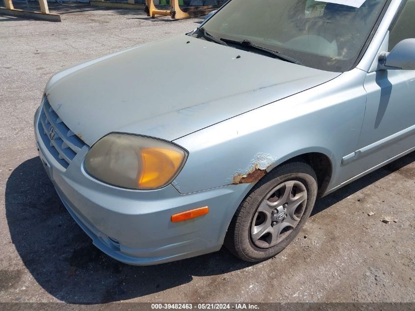 2005 Hyundai Accent Gls VIN: KMHCG45CX5U638691 Lot: 39482463