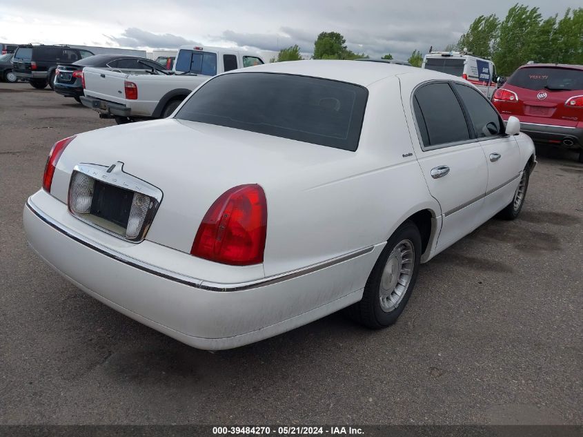 2000 Lincoln Town Car Executive VIN: 1LNHM81W0YY857615 Lot: 39484270