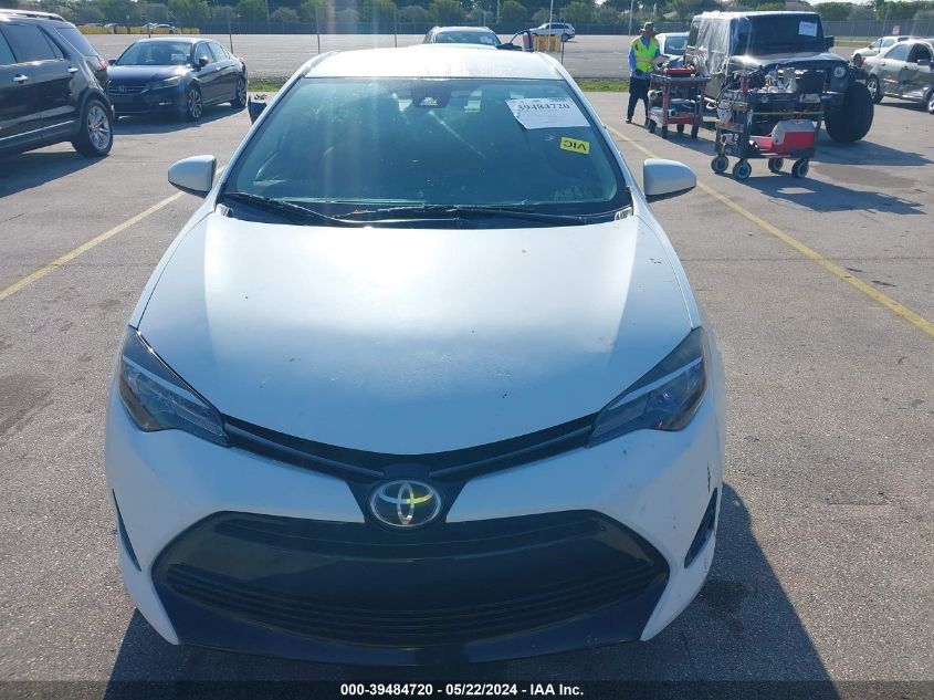 2017 Toyota Corolla Le VIN: 5YFBURHE9HP727754 Lot: 39484720