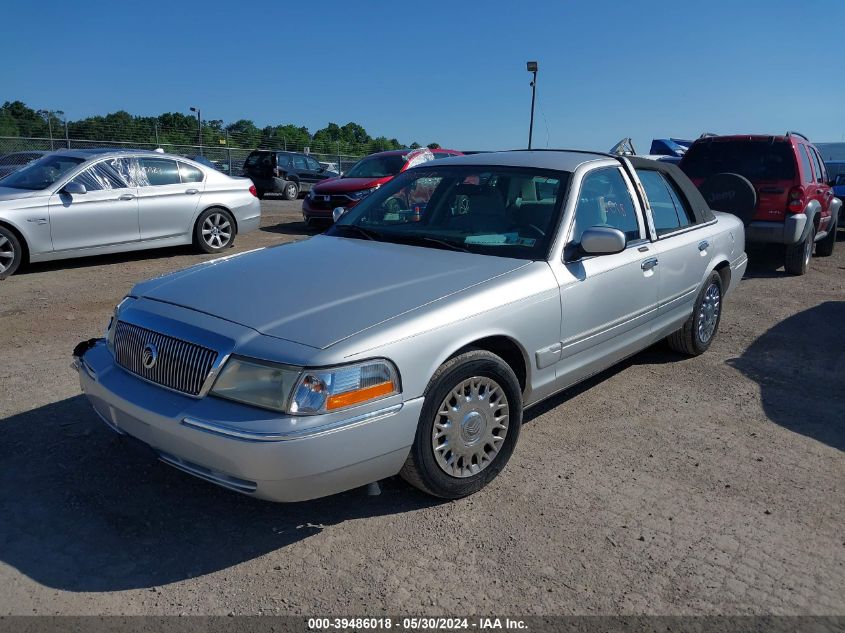 2003 Mercury Grand Marquis Gs VIN: 2MEFM74W33X678977 Lot: 39486018