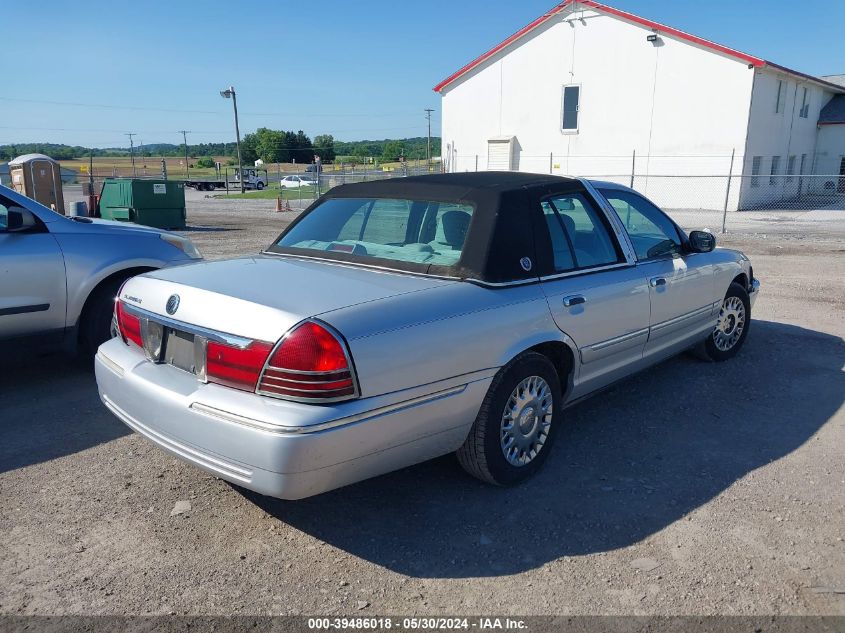 2003 Mercury Grand Marquis Gs VIN: 2MEFM74W33X678977 Lot: 39486018