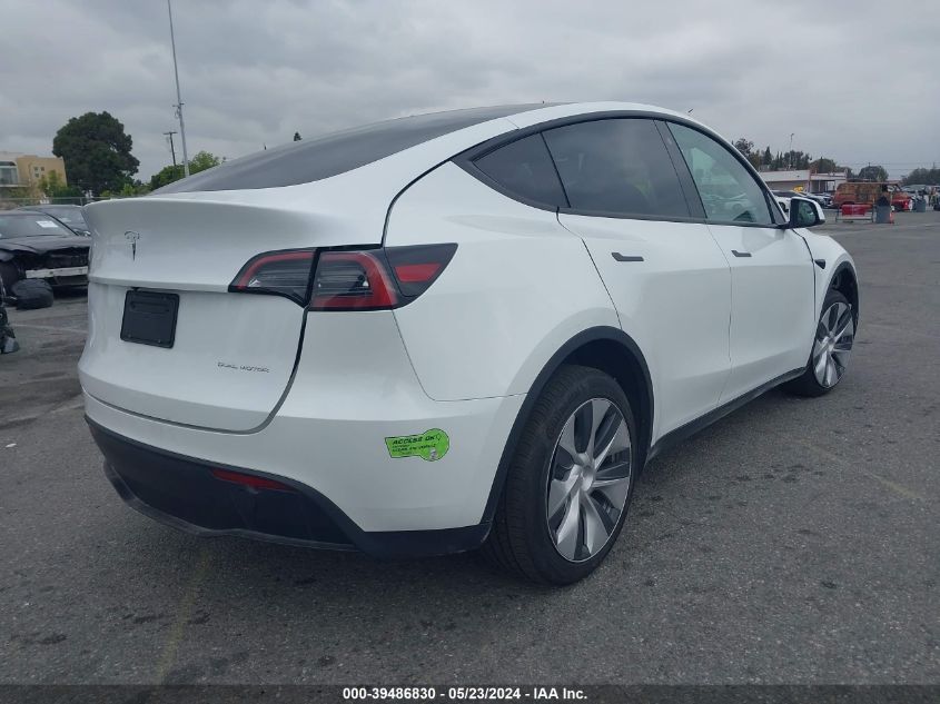 2023 Tesla Model Y Awd/Long Range Dual Motor All-Wheel Drive VIN: 7SAYGDEE6PF628914 Lot: 39486830