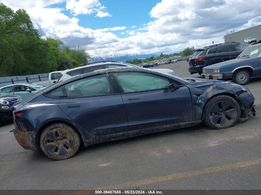 2022 Tesla Model 3 Long Range Dual Motor All-Wheel Drive VIN: 5YJ3E1EB7NF180164 Lot: 39487655