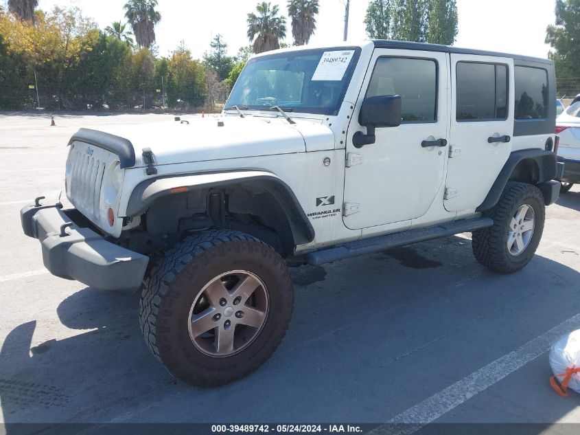 2008 Jeep Wrangler Unlimited X VIN: 1J4GA39198L593001 Lot: 39489742