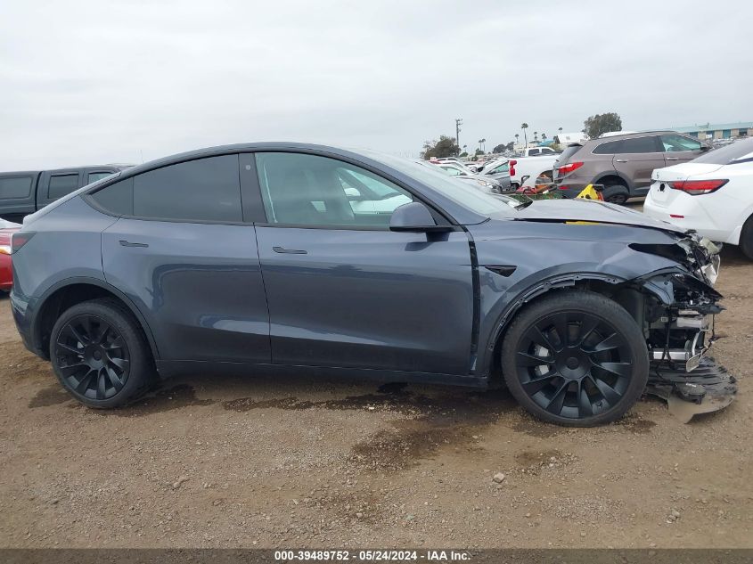 2023 Tesla Model Y Awd/Long Range Dual Motor All-Wheel Drive VIN: 7SAYGDEE6PA109939 Lot: 39489752