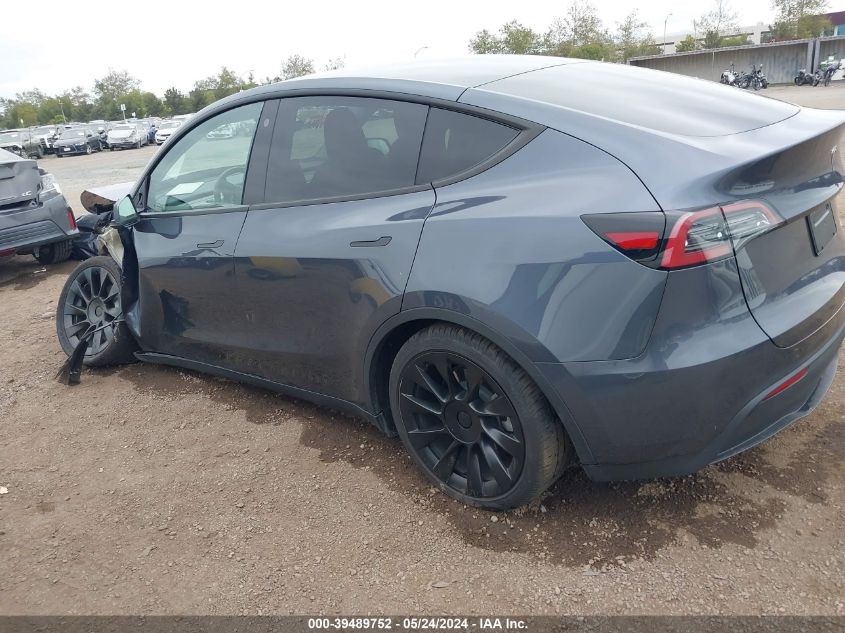 2023 Tesla Model Y Awd/Long Range Dual Motor All-Wheel Drive VIN: 7SAYGDEE6PA109939 Lot: 39489752