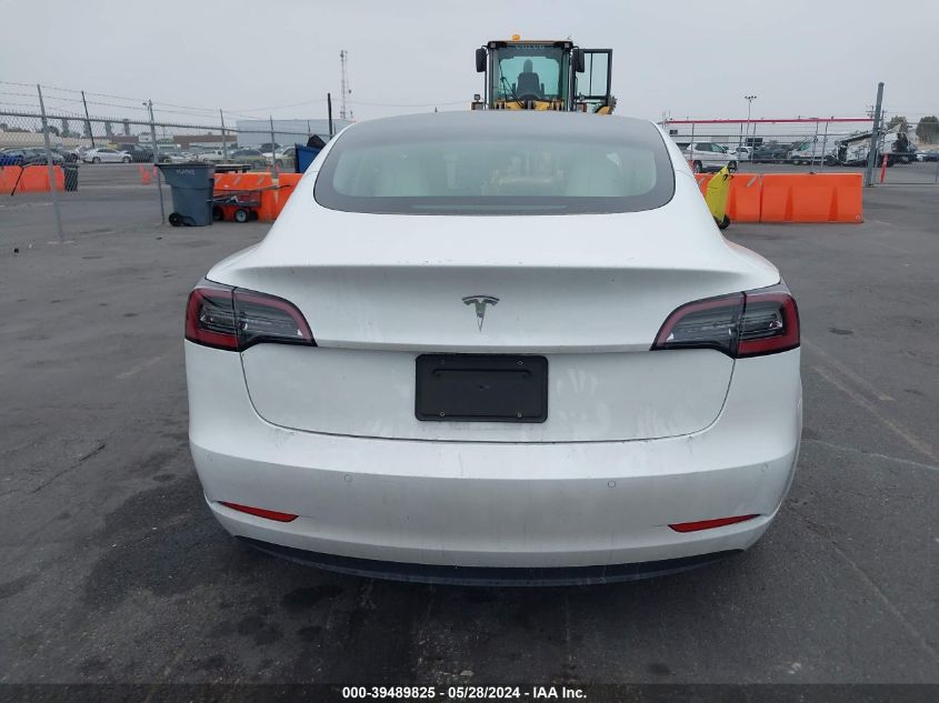 2021 Tesla Model 3 Standard Range Plus Rear-Wheel Drive VIN: 5YJ3E1EA7MF052884 Lot: 39489825