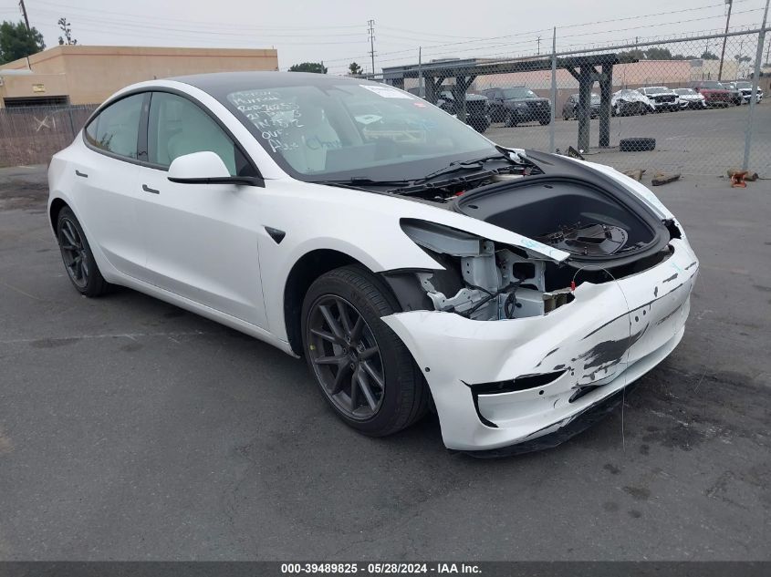 2021 Tesla Model 3 Standard Range Plus Rear-Wheel Drive VIN: 5YJ3E1EA7MF052884 Lot: 39489825