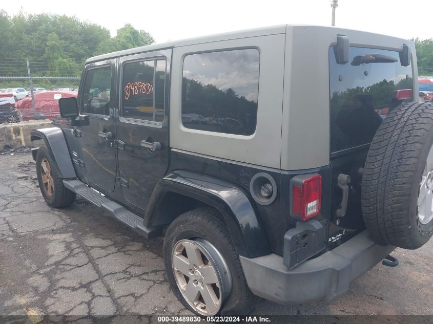 2007 Jeep Wrangler Unlimited Sahara VIN: 1J4GA59107L195024 Lot: 39489830