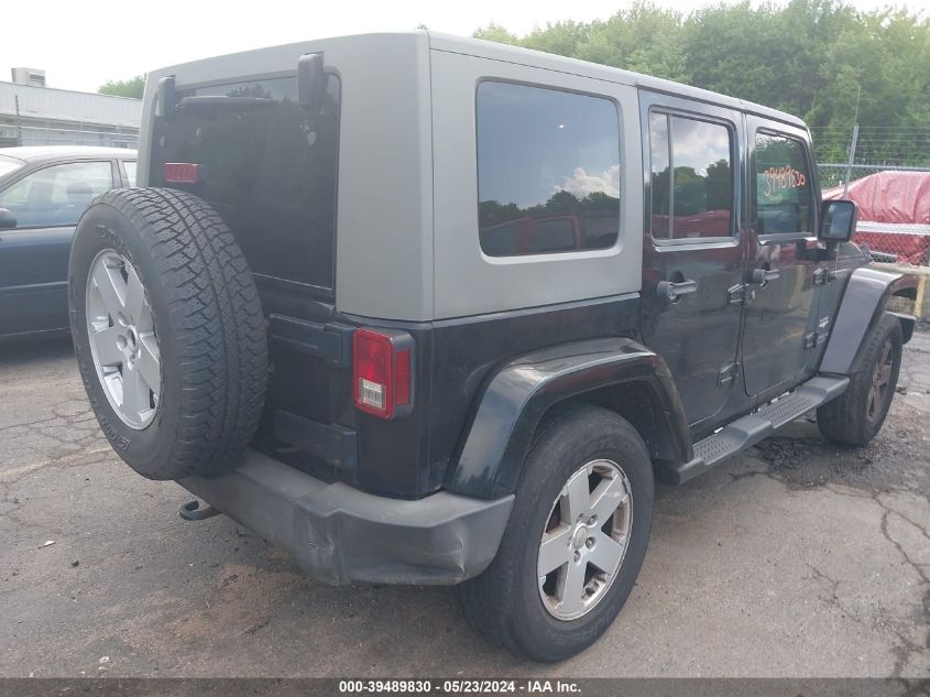 2007 Jeep Wrangler Unlimited Sahara VIN: 1J4GA59107L195024 Lot: 39489830