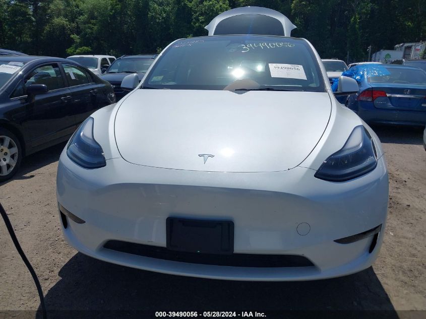 2023 Tesla Model Y Awd/Long Range Dual Motor All-Wheel Drive VIN: 7SAYGAEE0PF770285 Lot: 39490056