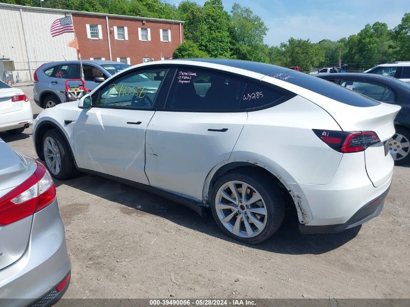 2023 Tesla Model Y Awd/Long Range Dual Motor All-Wheel Drive VIN: 7SAYGAEE0PF770285 Lot: 39490056