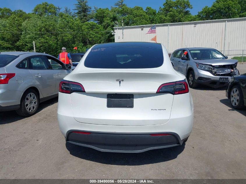 2023 Tesla Model Y Awd/Long Range Dual Motor All-Wheel Drive VIN: 7SAYGAEE0PF770285 Lot: 39490056