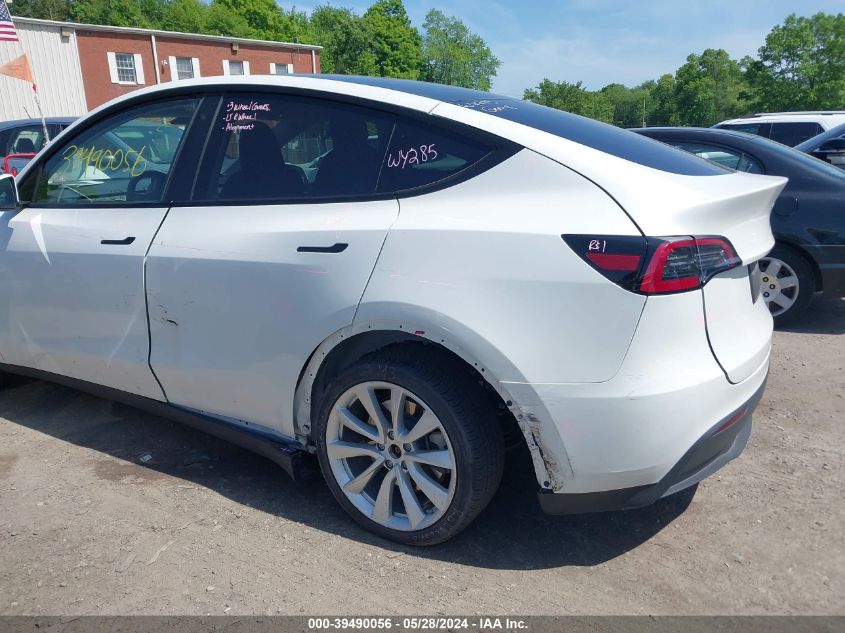 2023 Tesla Model Y Awd/Long Range Dual Motor All-Wheel Drive VIN: 7SAYGAEE0PF770285 Lot: 39490056