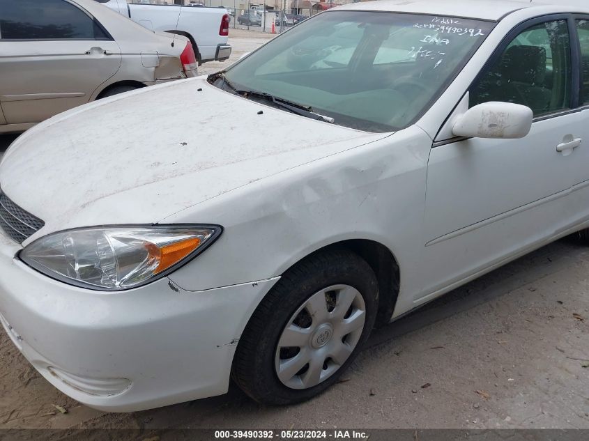 2004 Toyota Camry Le VIN: 4T1BE32K04U279812 Lot: 39490392