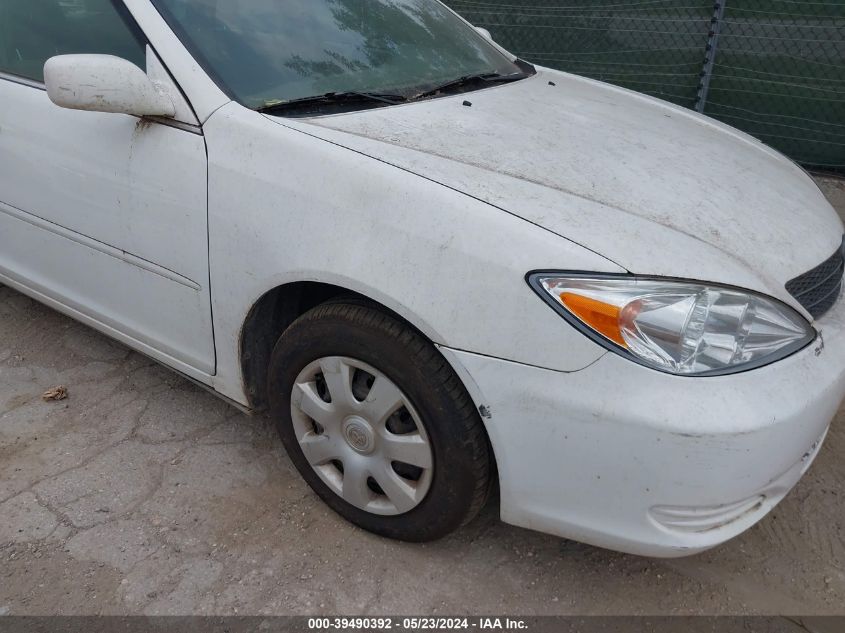 2004 Toyota Camry Le VIN: 4T1BE32K04U279812 Lot: 39490392