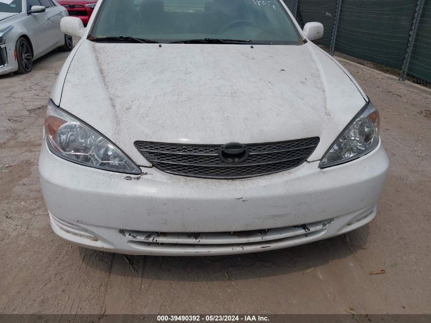 2004 Toyota Camry Le VIN: 4T1BE32K04U279812 Lot: 39490392