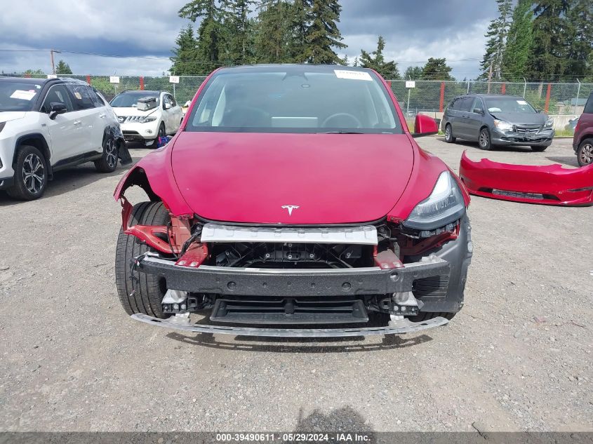 2023 Tesla Model Y Awd/Long Range Dual Motor All-Wheel Drive VIN: 7SAYGDEE7PA116026 Lot: 39490611