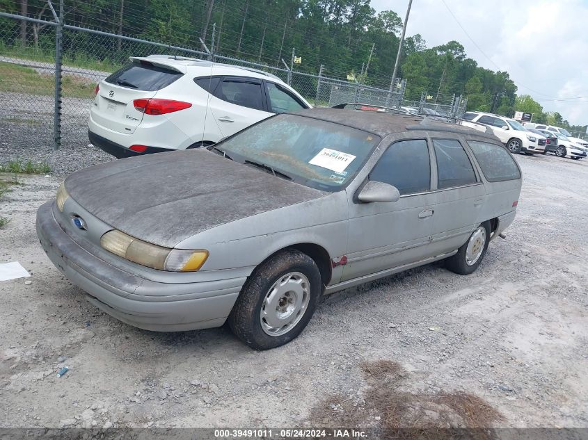 1994 Ford Taurus Gl VIN: 1FALP57U9RA103574 Lot: 39491011