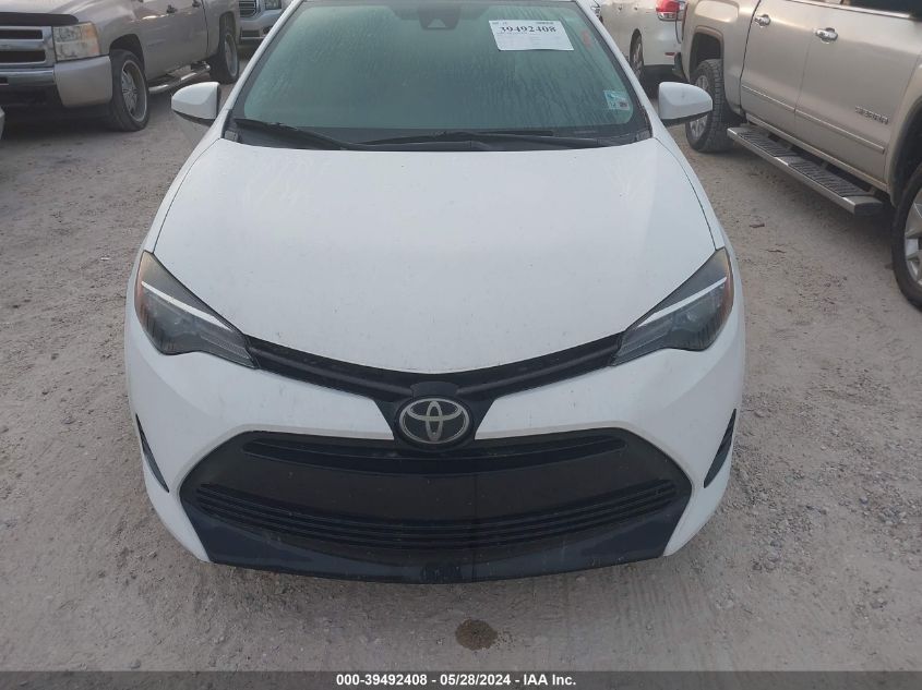 2018 Toyota Corolla Le VIN: 5YFBURHE1JP822783 Lot: 39492408