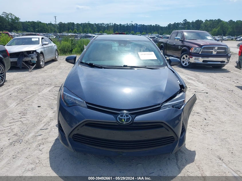 2017 Toyota Corolla Le VIN: 2T1BURHE9HC823545 Lot: 39492661