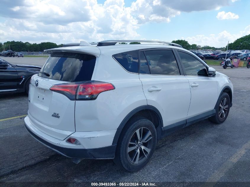 VIN 2T3WFREVXJW410318 2018 Toyota RAV4, Xle no.4