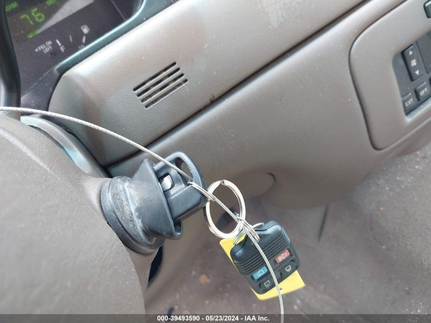 1999 Lincoln Town Car Cartier VIN: 1LNHM83W6XY603807 Lot: 39493590