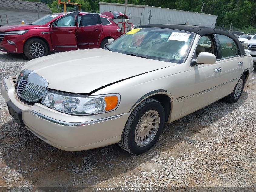 1999 Lincoln Town Car Cartier VIN: 1LNHM83W6XY603807 Lot: 39493590