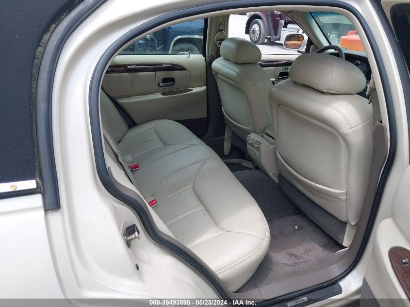 1999 Lincoln Town Car Cartier VIN: 1LNHM83W6XY603807 Lot: 39493590