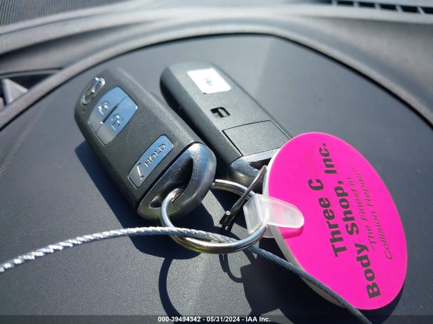 2014 Mazda Mazda3 I Touring VIN: JM1BM1L70E1157802 Lot: 39494342