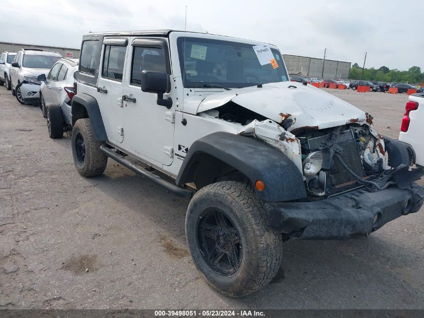 2009 Jeep Wrangler Unlimited X VIN: 1J4GB39199L735717 Lot: 39498051