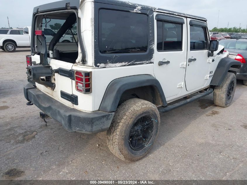 2009 Jeep Wrangler Unlimited X VIN: 1J4GB39199L735717 Lot: 39498051