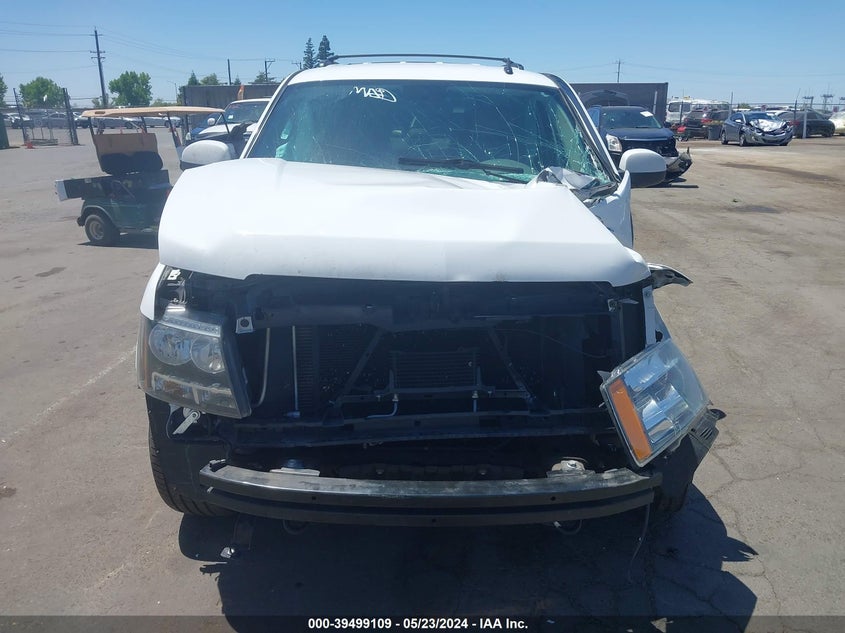 2014 Chevrolet Tahoe Lt VIN: 1GNSKBE05ER247502 Lot: 39499109