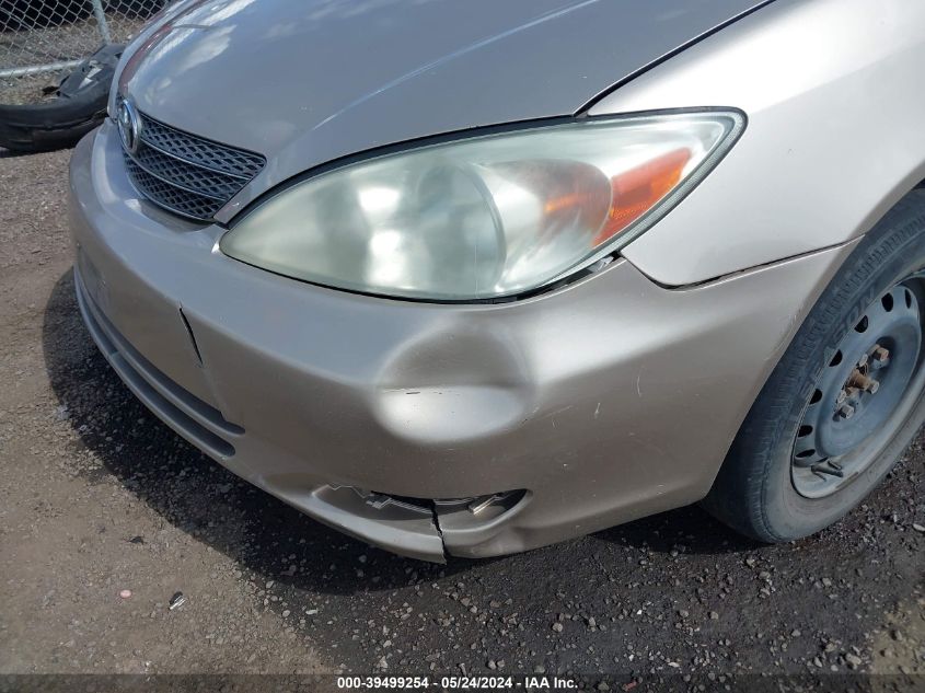 2003 Toyota Camry Le VIN: JTDBE32K030224433 Lot: 39499254