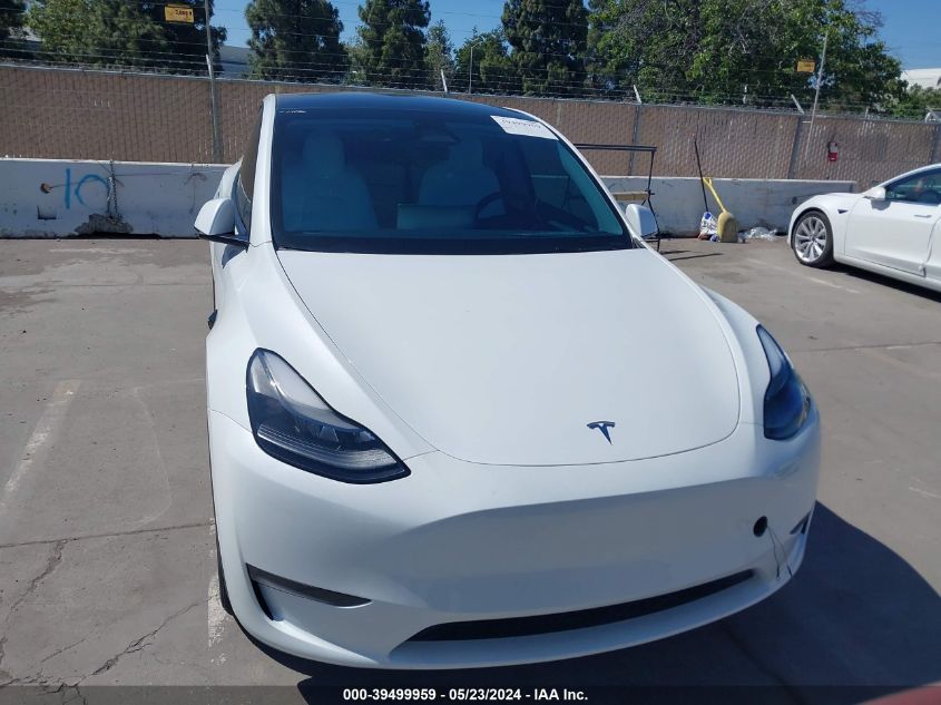 2023 Tesla Model Y Awd/Long Range Dual Motor All-Wheel Drive VIN: 7SAYGDEE6PF853320 Lot: 39499959