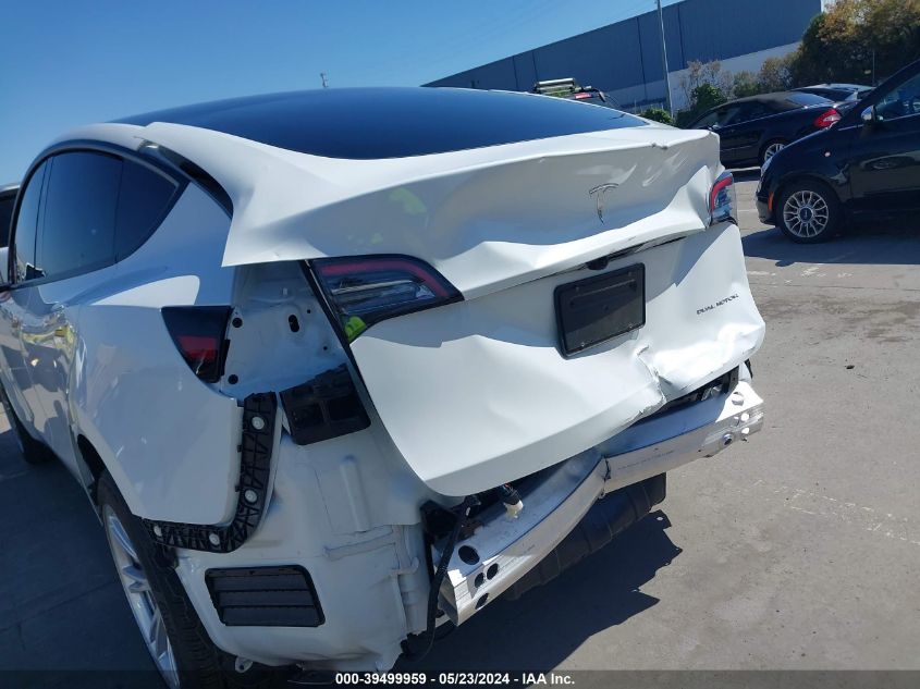 2023 Tesla Model Y Awd/Long Range Dual Motor All-Wheel Drive VIN: 7SAYGDEE6PF853320 Lot: 39499959