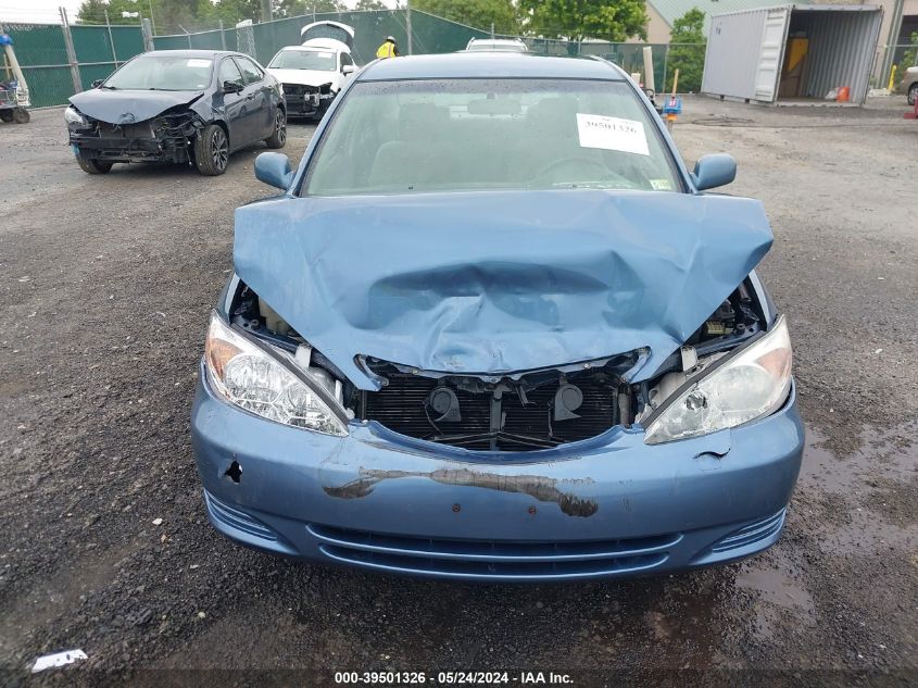 2003 Toyota Camry Le VIN: 4T1BE32K23U786693 Lot: 39501326