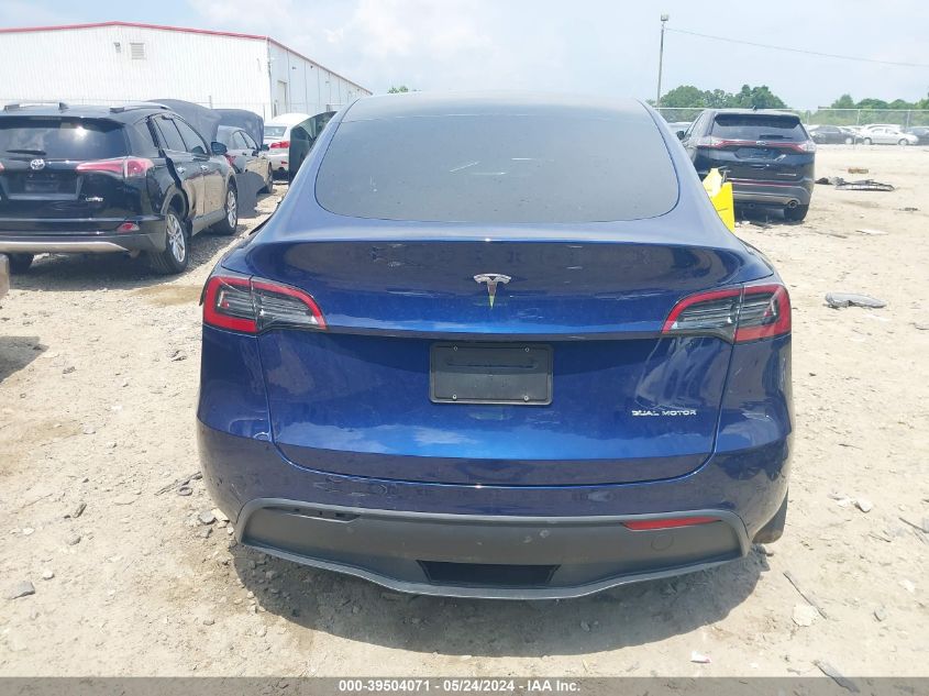 2023 Tesla Model Y Awd/Long Range Dual Motor All-Wheel Drive VIN: 7SAYGAEE6PF582435 Lot: 39504071