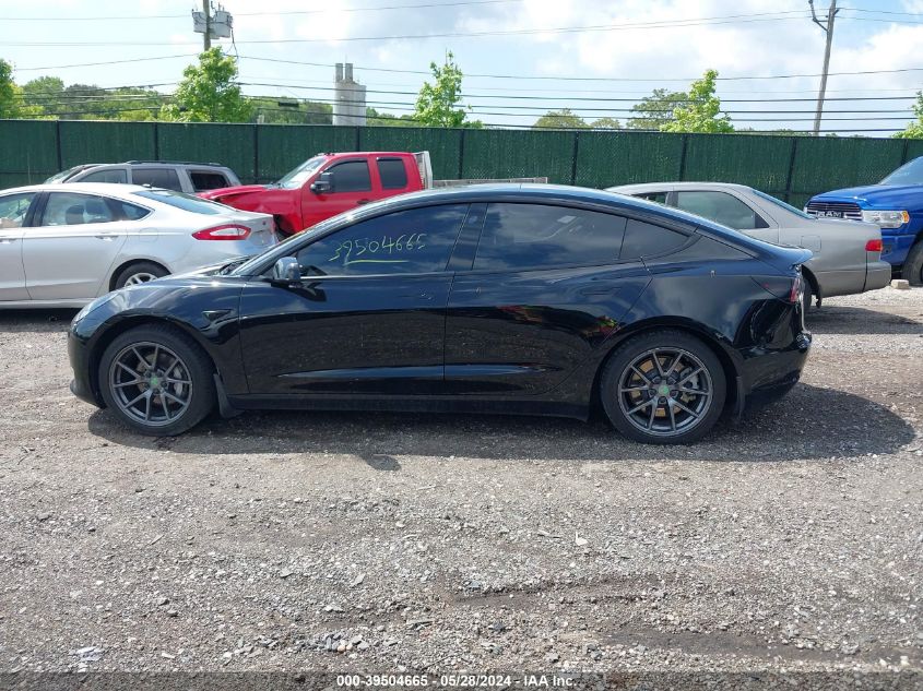 2022 Tesla Model 3 Rear-Wheel Drive VIN: 5YJ3E1EA1NF106617 Lot: 39504665