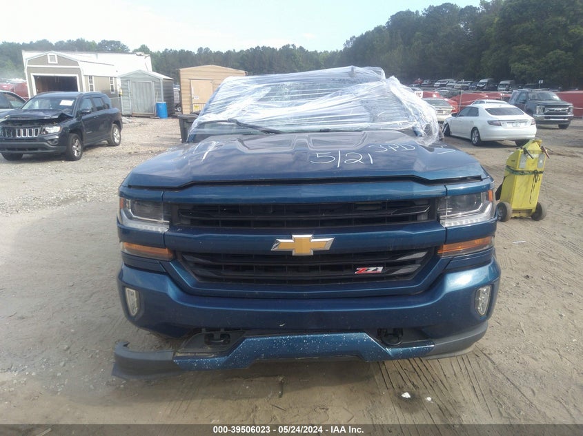 2018 Chevrolet Silverado 1500 2Lt VIN: 3GCUKREC3JG410212 Lot: 39506023