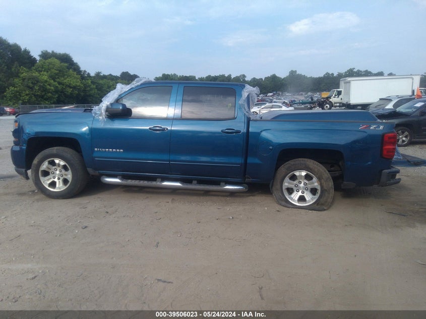 2018 Chevrolet Silverado 1500 2Lt VIN: 3GCUKREC3JG410212 Lot: 39506023