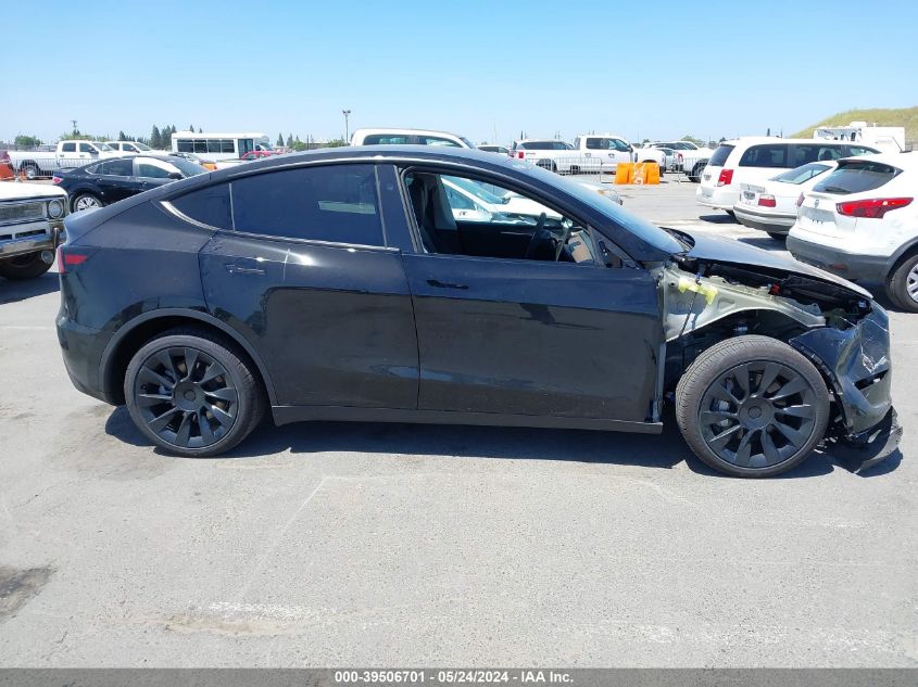 2023 Tesla Model Y Awd/Long Range Dual Motor All-Wheel Drive VIN: 7SAYGDEE7PF912892 Lot: 39506701