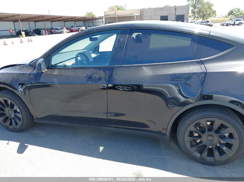 2023 Tesla Model Y Awd/Long Range Dual Motor All-Wheel Drive VIN: 7SAYGDEE7PF912892 Lot: 39506701