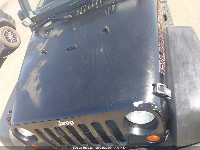 2011 Jeep Wrangler Unlimited Rubicon VIN: 1J4BA6H12BL527328 Lot: 39507933