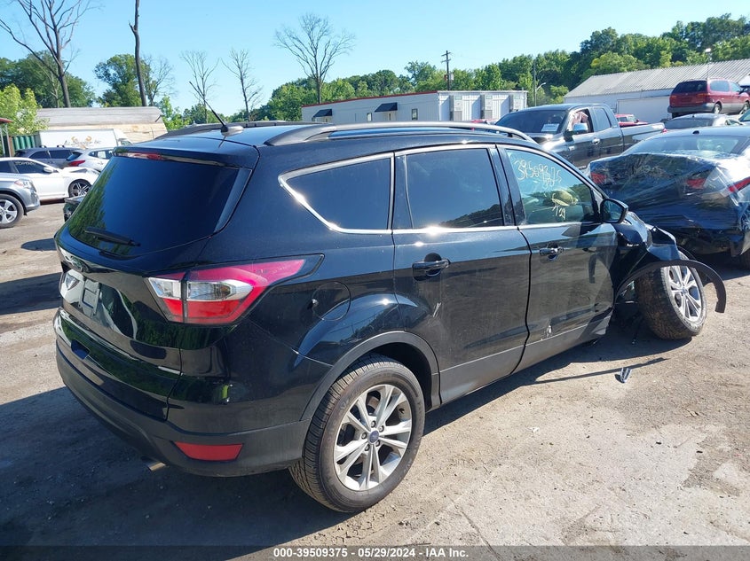 2018 Ford Escape Se VIN: 1FMCU9GD0JUB16917 Lot: 39509375