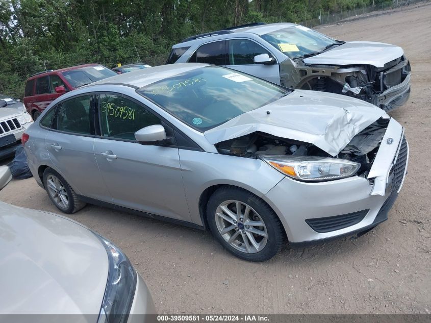 2018 Ford Focus Se VIN: 1FADP3FE7JL320911 Lot: 39509581