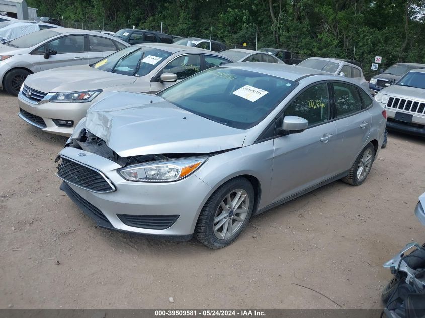 2018 Ford Focus Se VIN: 1FADP3FE7JL320911 Lot: 39509581